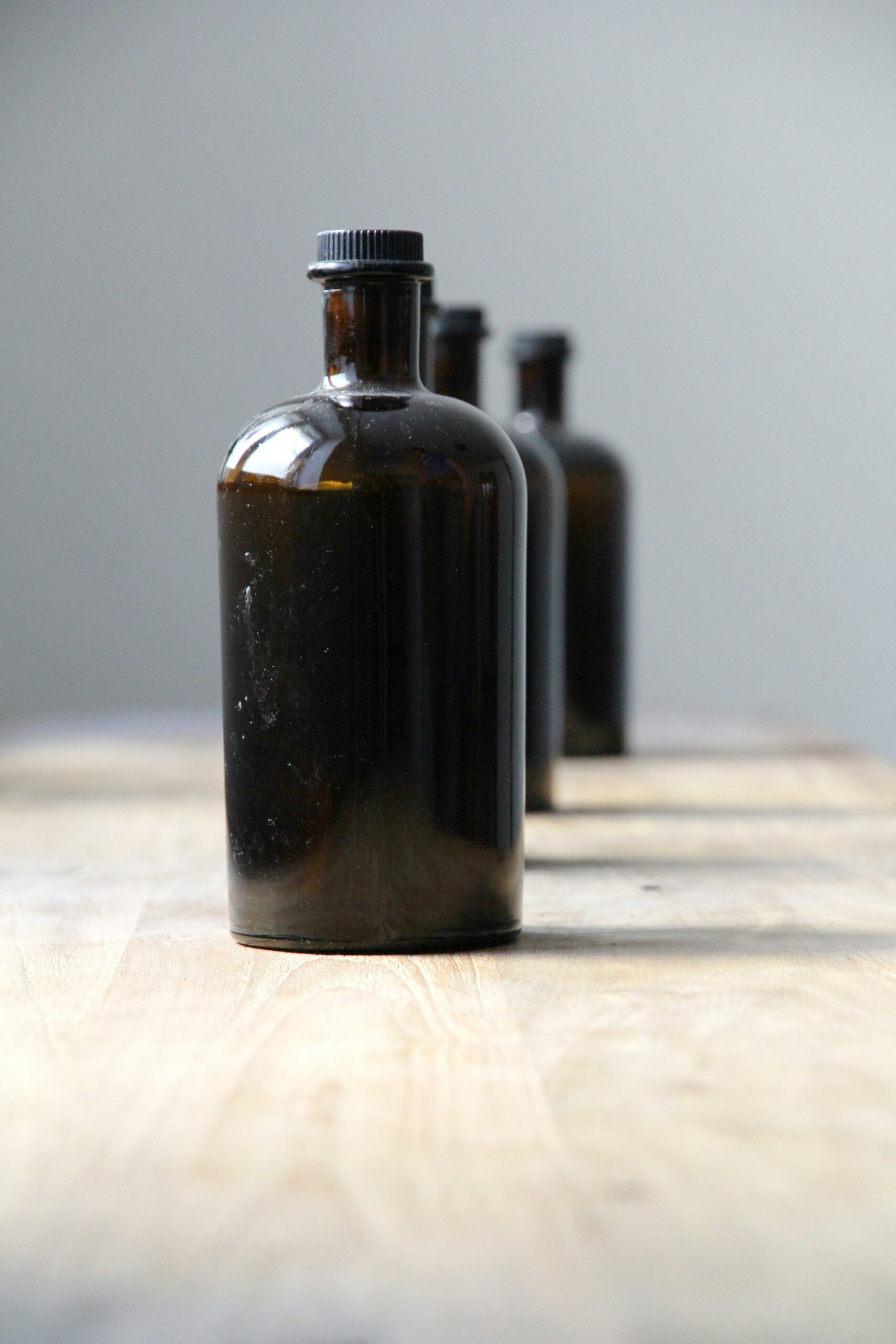 RoCanna dropper bottle resting on natural textile